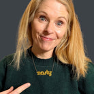 Sarah Day, founder of Wear and Resist wears an ultra gold Nasty necklace.