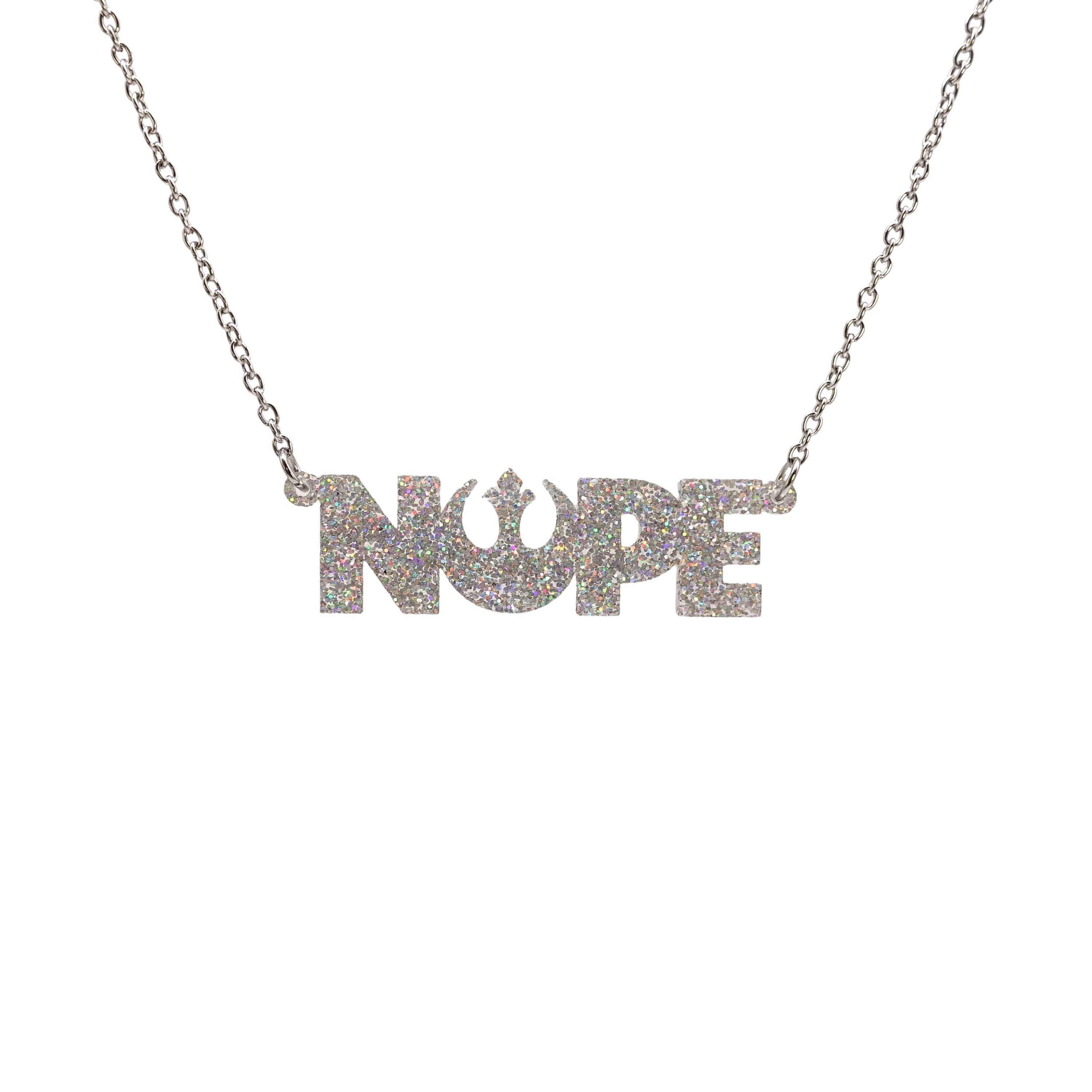 Nope necklace with Rebel Alliance symbol in silver glitter hanging on a stainless steel chain against a white background.