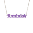 Parma violet Feminist necklace shown hanging on a white background.