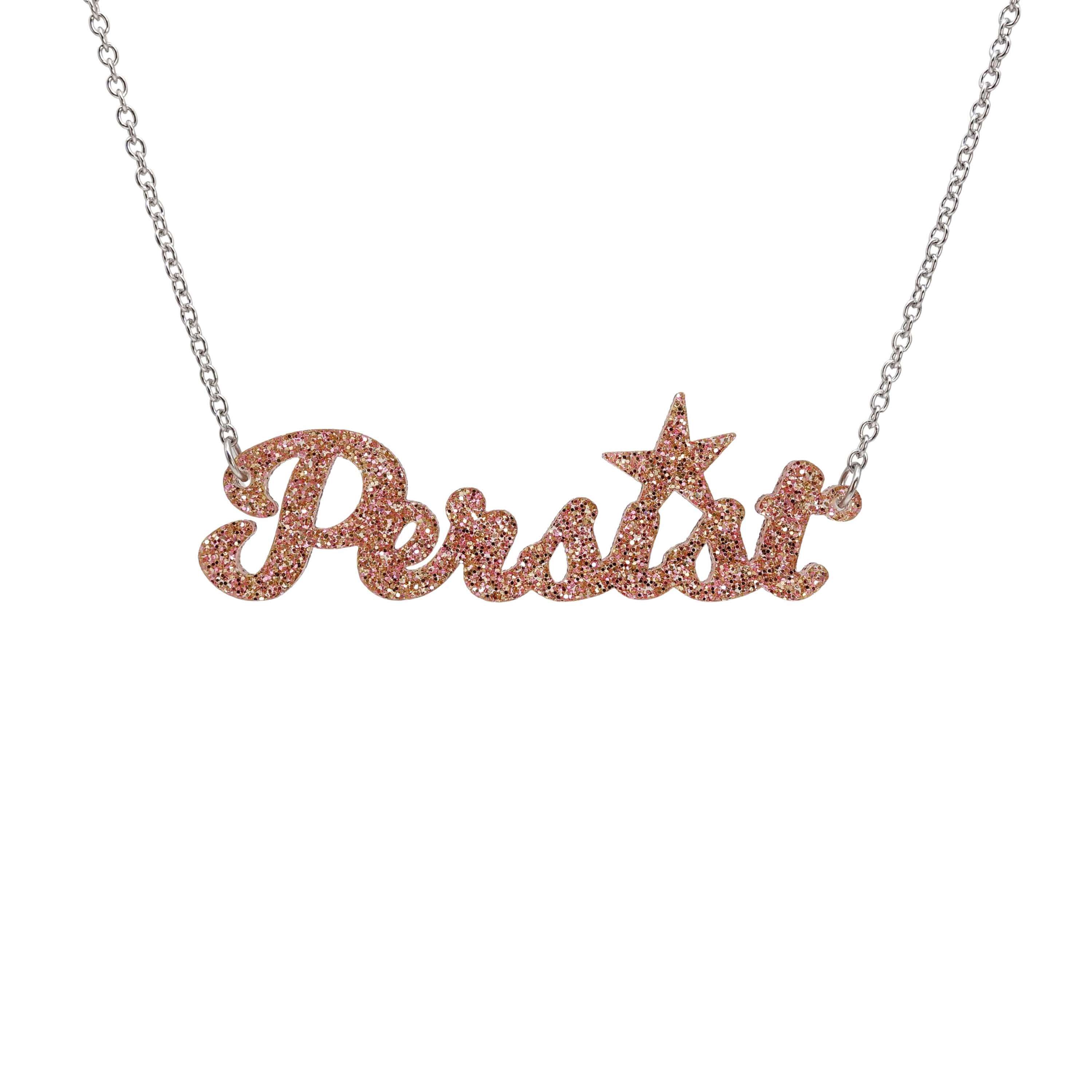 Persist necklaace in pink fizz glitter, shown hanging against a white background.