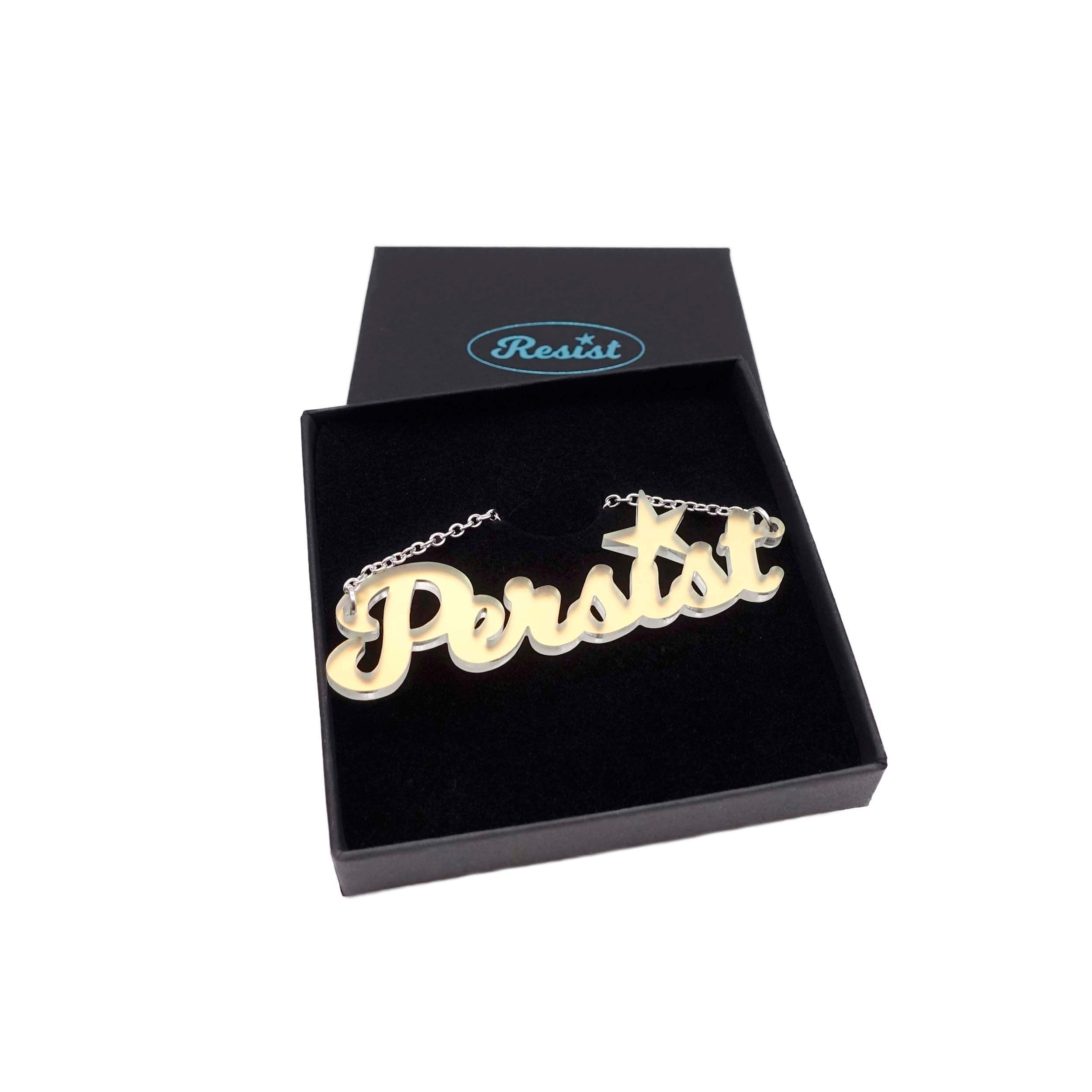 Persist necklace in script font in skylight, shown in a Wear and Resist gift box. Join the Persisterhood!