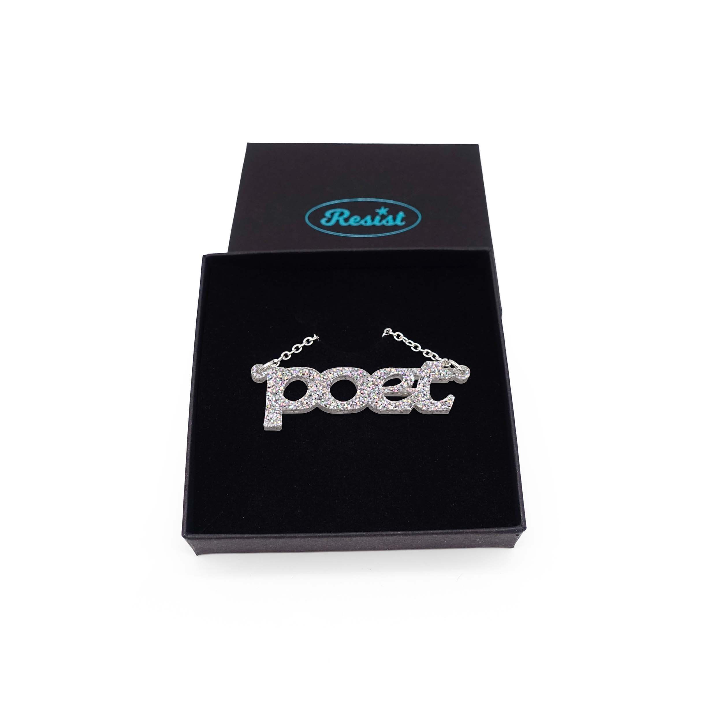 Poet necklace in silver glitter, shown in a Wear and Resist gift box.