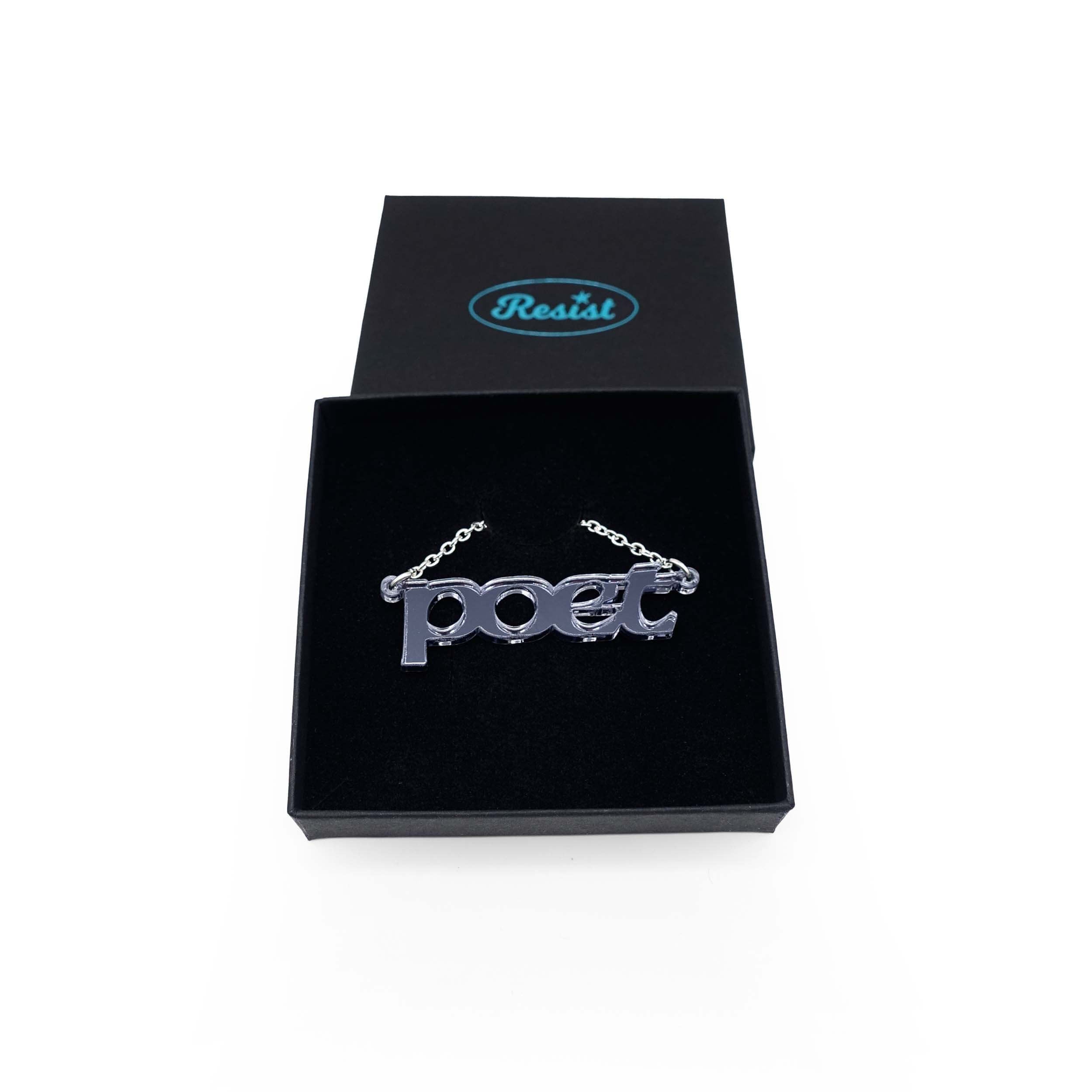 Poet necklace in slate mirror, shown in a Wear and Resist gift box.