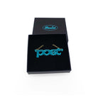 Poet necklace in teal mirror, shown in a Wear and Resist gift box.