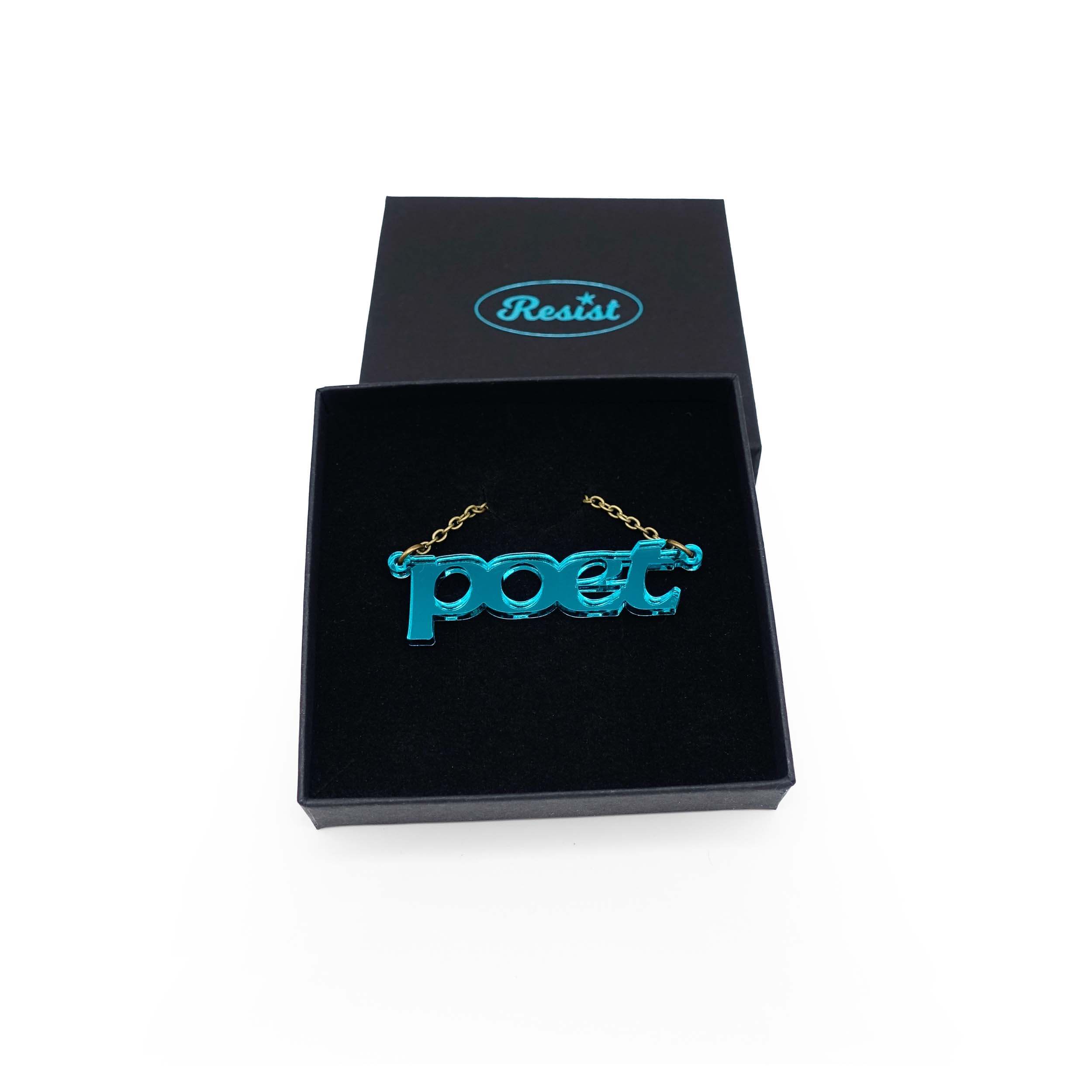 Poet necklace in teal mirror, shown in a Wear and Resist gift box.