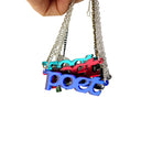 A group of Poet necklaces in different colours shown hanging together.