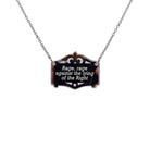 Rage, rage against the Lying of the Right mirror cowboy necklace in silver, shown hanging on a stainless steel chain.
