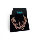 Champagne glitter Rebel Rebel necklace shown in a Wear and Resist gift box.