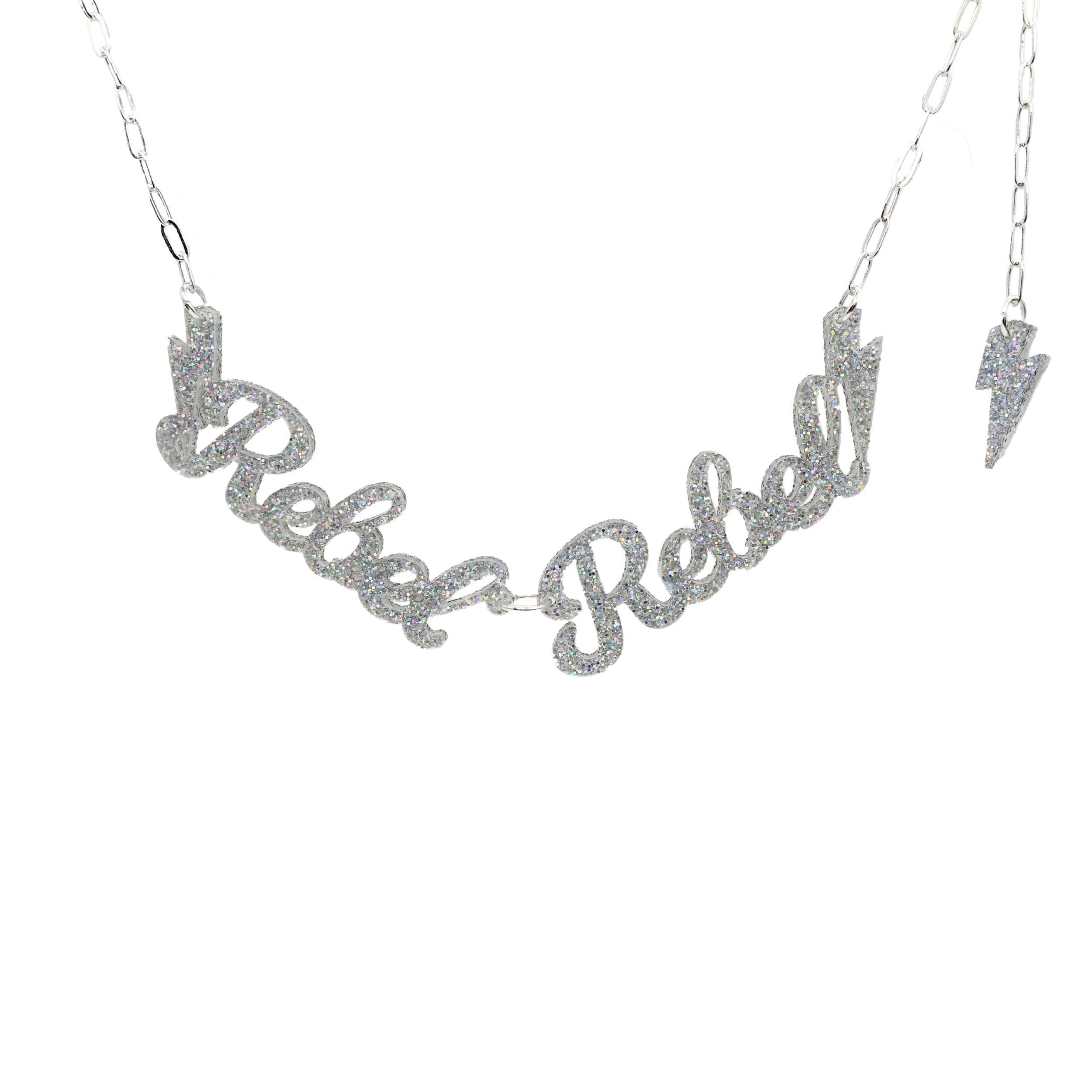 Rebel Rebel necklace in silver glitter shown hanging against a white background. 