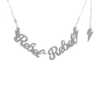 Rebel Rebel necklace in silver glitter shown hanging against a white background.