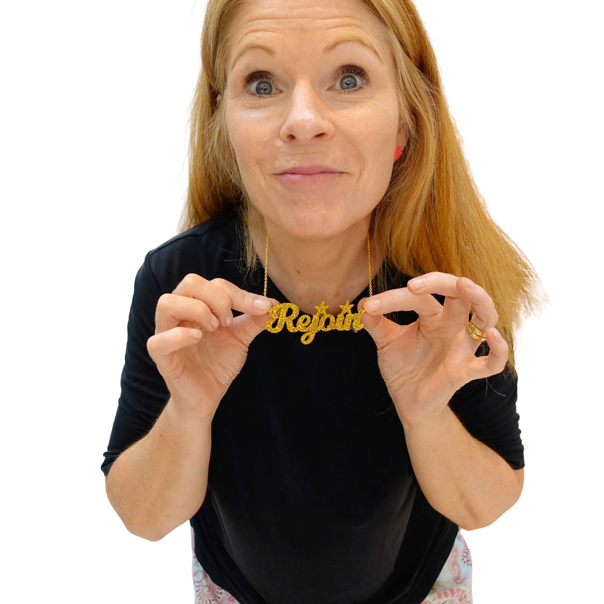 Sarah Day, founder of Wear and Resist wears a Rejoin the EU necklace in ultra gold. Proud to be a European!