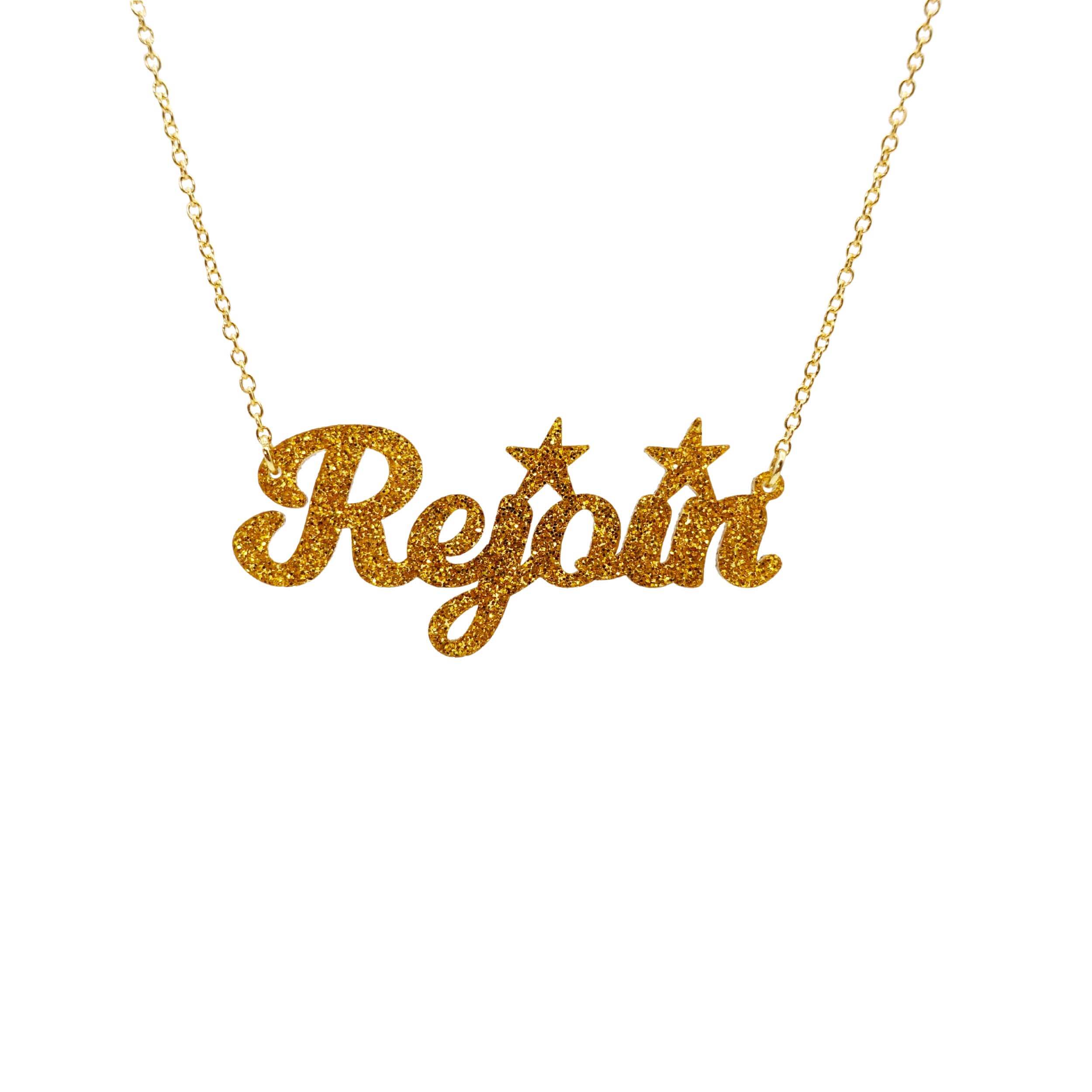 Rejoin the EU necklace in ultra gold glitter, shown hanging against a white background.