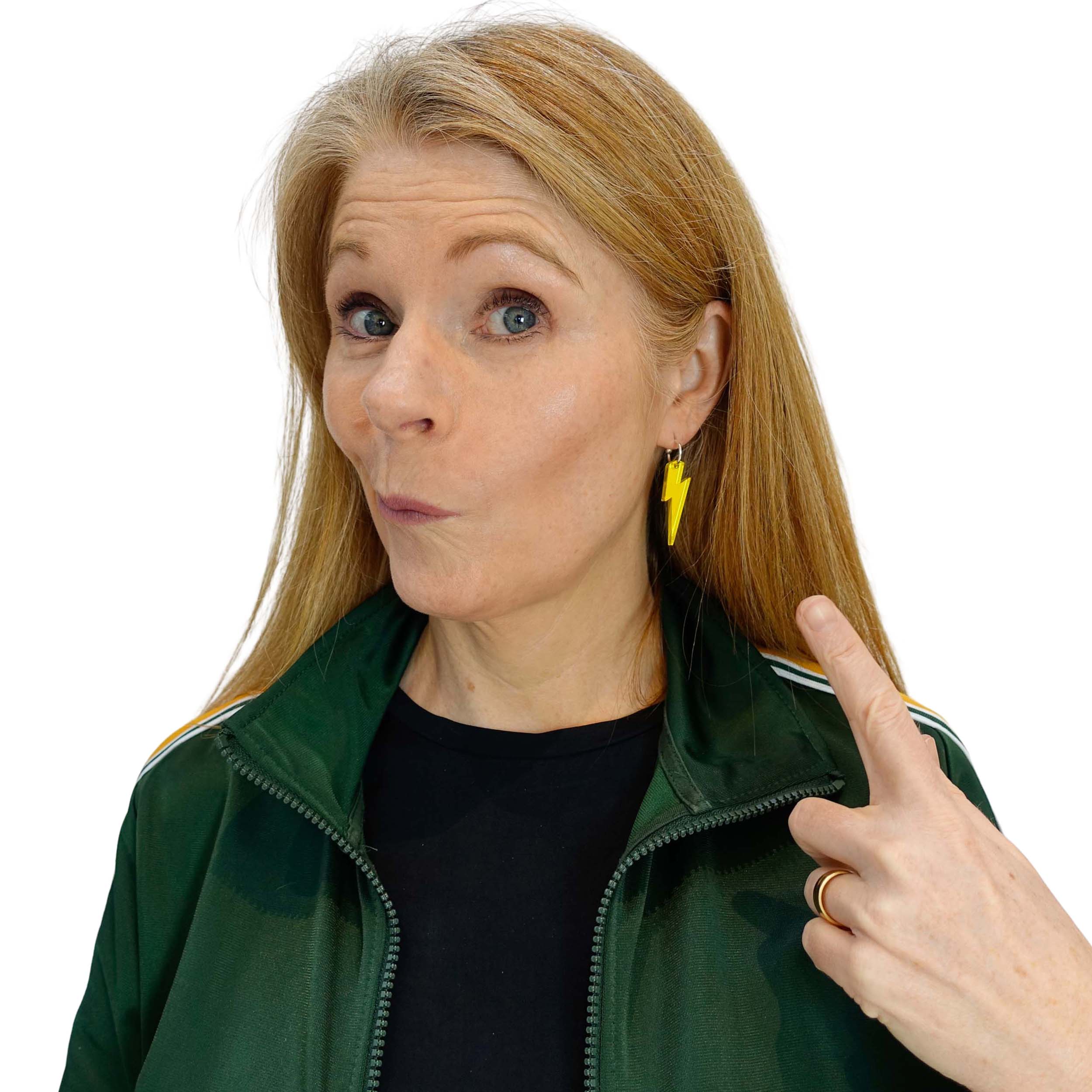 Sarah wears medium yellow mirror mix and match lightning bolt earrings.