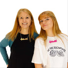 Sarah and Eliza wear Splendid necklaces in matte iridescent and neon pink.