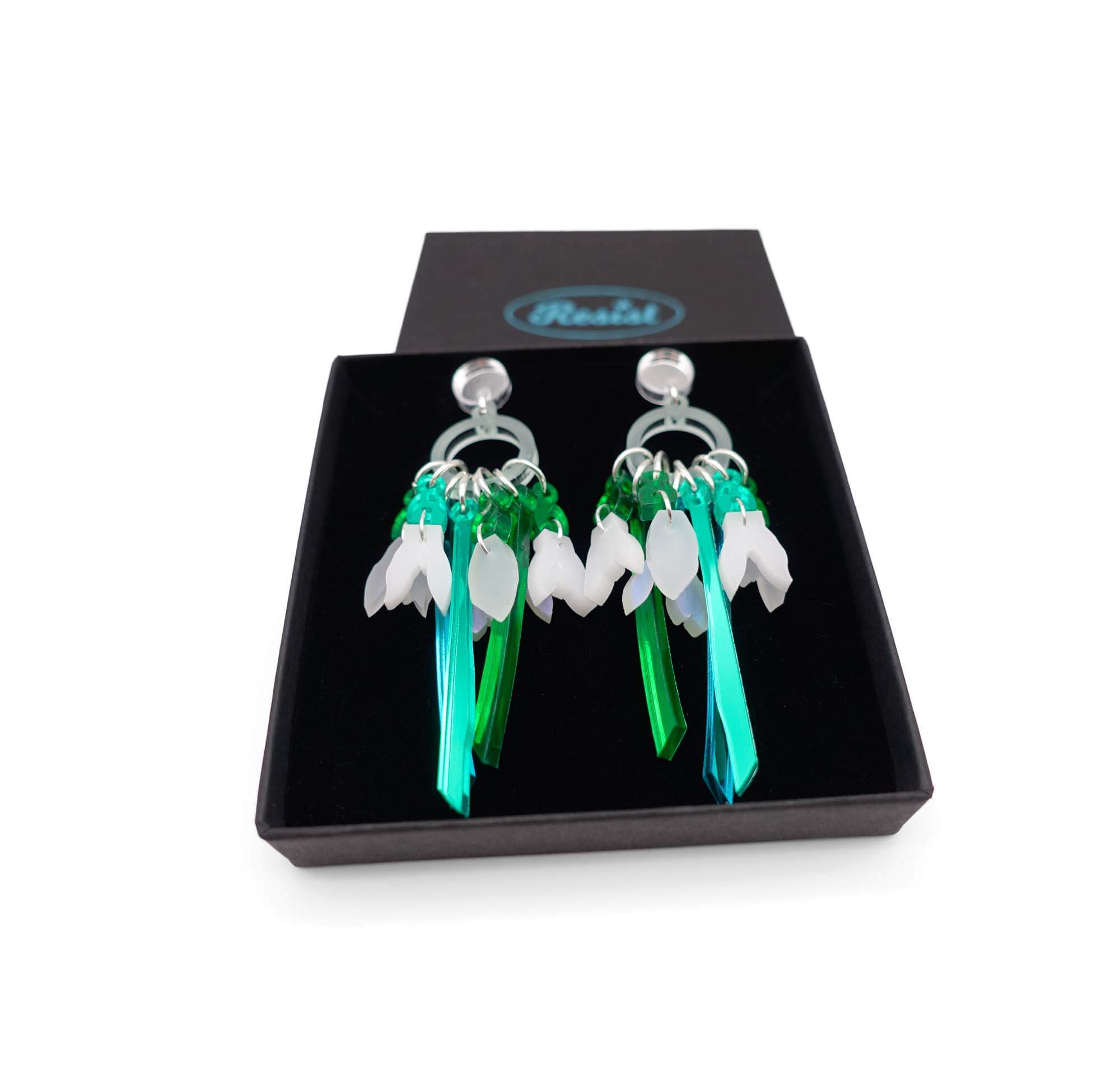 Snowdrop earrings shown in a Wear and Resist gift box.