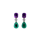 A pair of drop earrings featuring purple and green acrylic gems with silver accents in the suffragette colours.