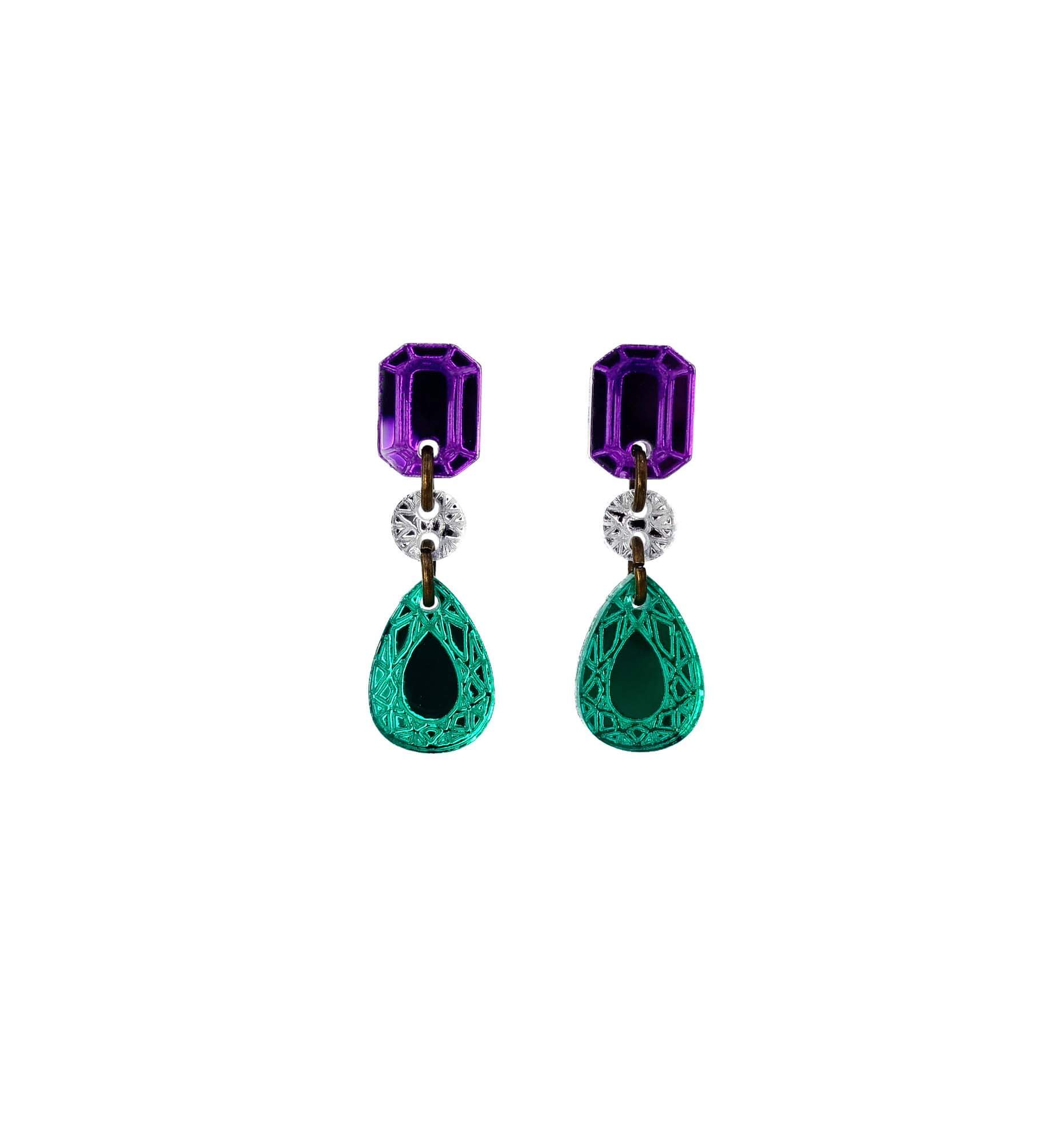 A pair of drop earrings featuring purple and green acrylic gems with silver accents in the suffragette colours.