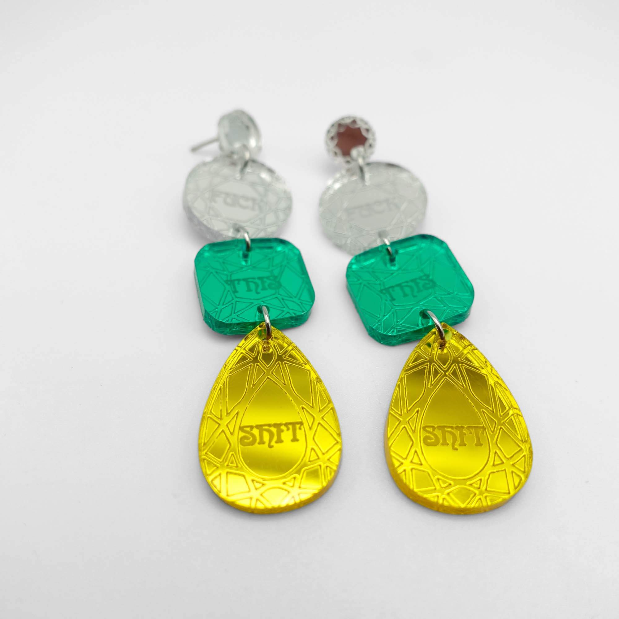 Sweary jewel drop earrings in silver, green and yellow, shown laying on a white background.