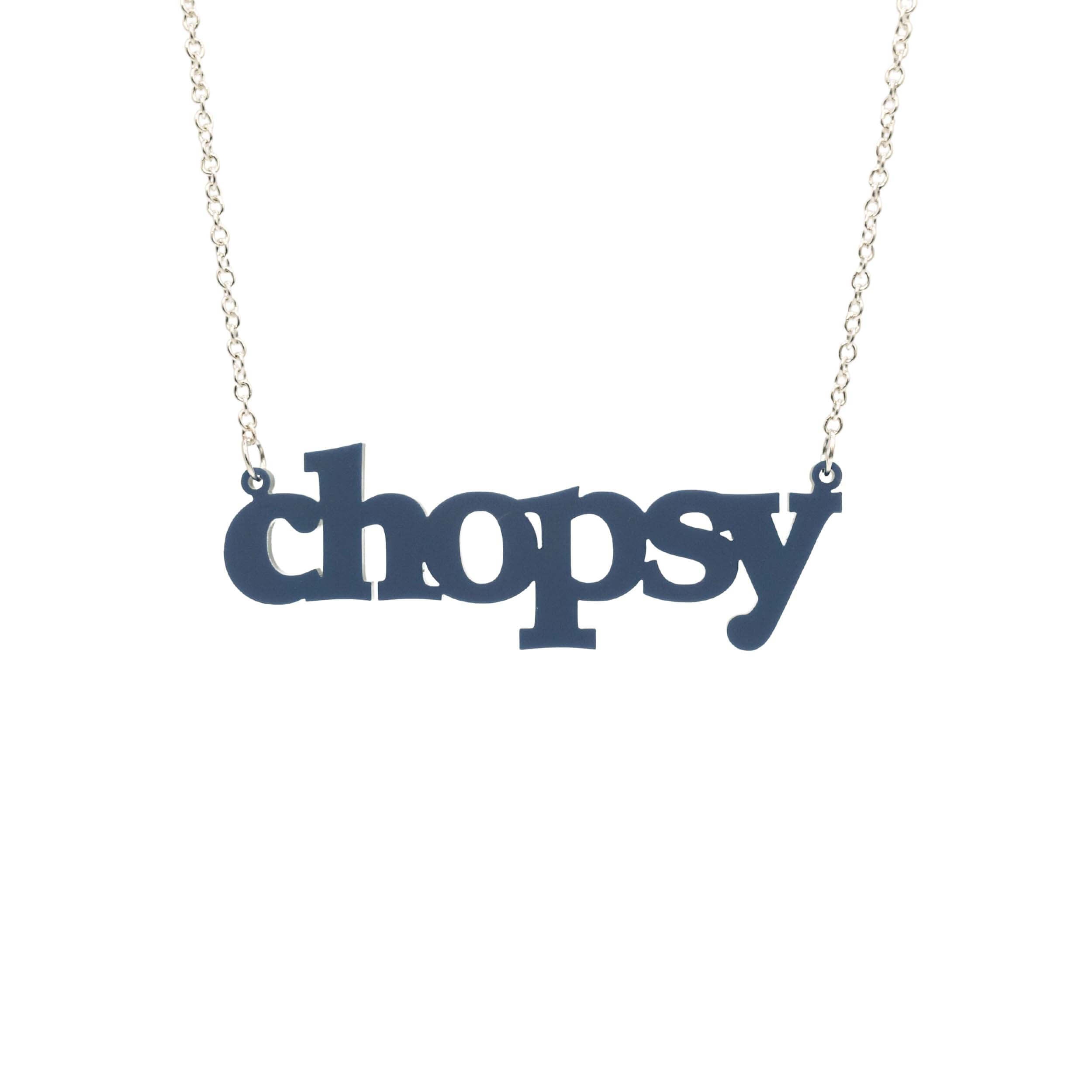 Welsh slate Chopsy necklace shown hanging against a white backround.
