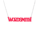 A necklace that says 'Wordsmith' in hot pink, shown hanging against a white background.