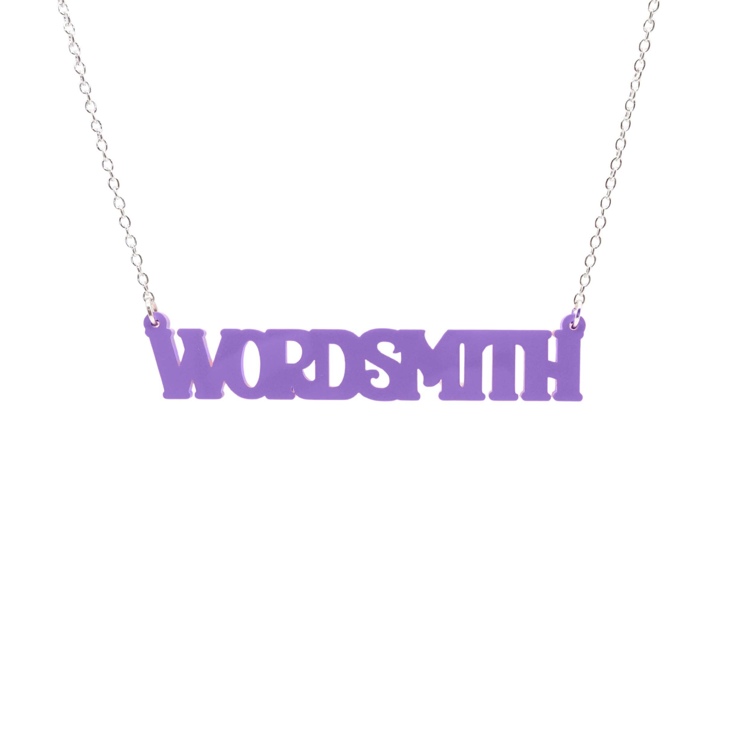 A necklace that says 'Wordsmith' in parma violet, shown hanging against a white background.