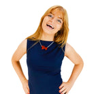 Eliza wears a Yay necklace in hot red.