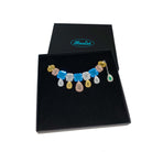 Belle Epoque jewel necklace in soft blue colours, shown in a large Wear and Resist gift box.