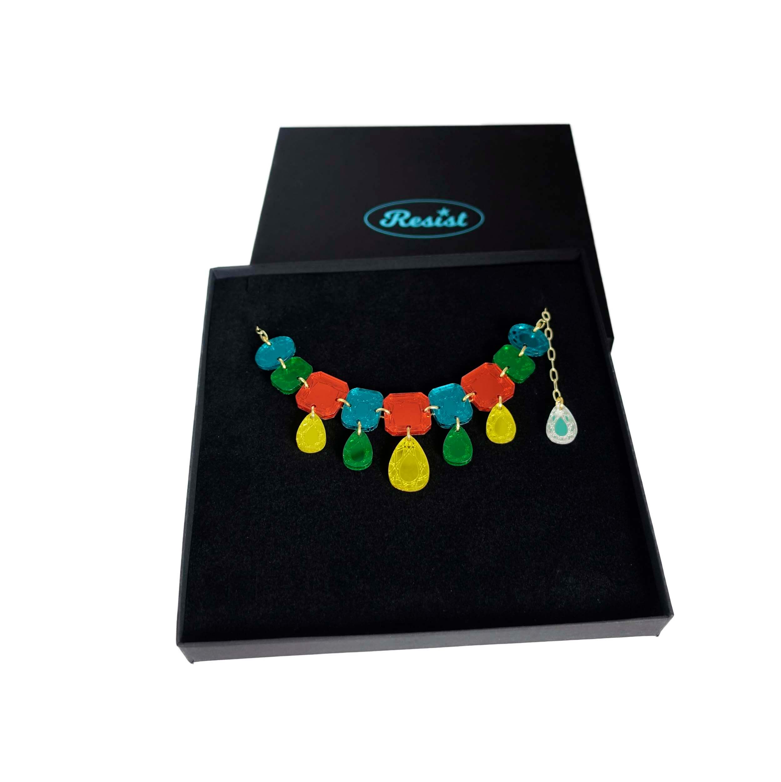 Austerity jewels necklace in flame mambo colours, shown in a Wear and Resist gift box. 