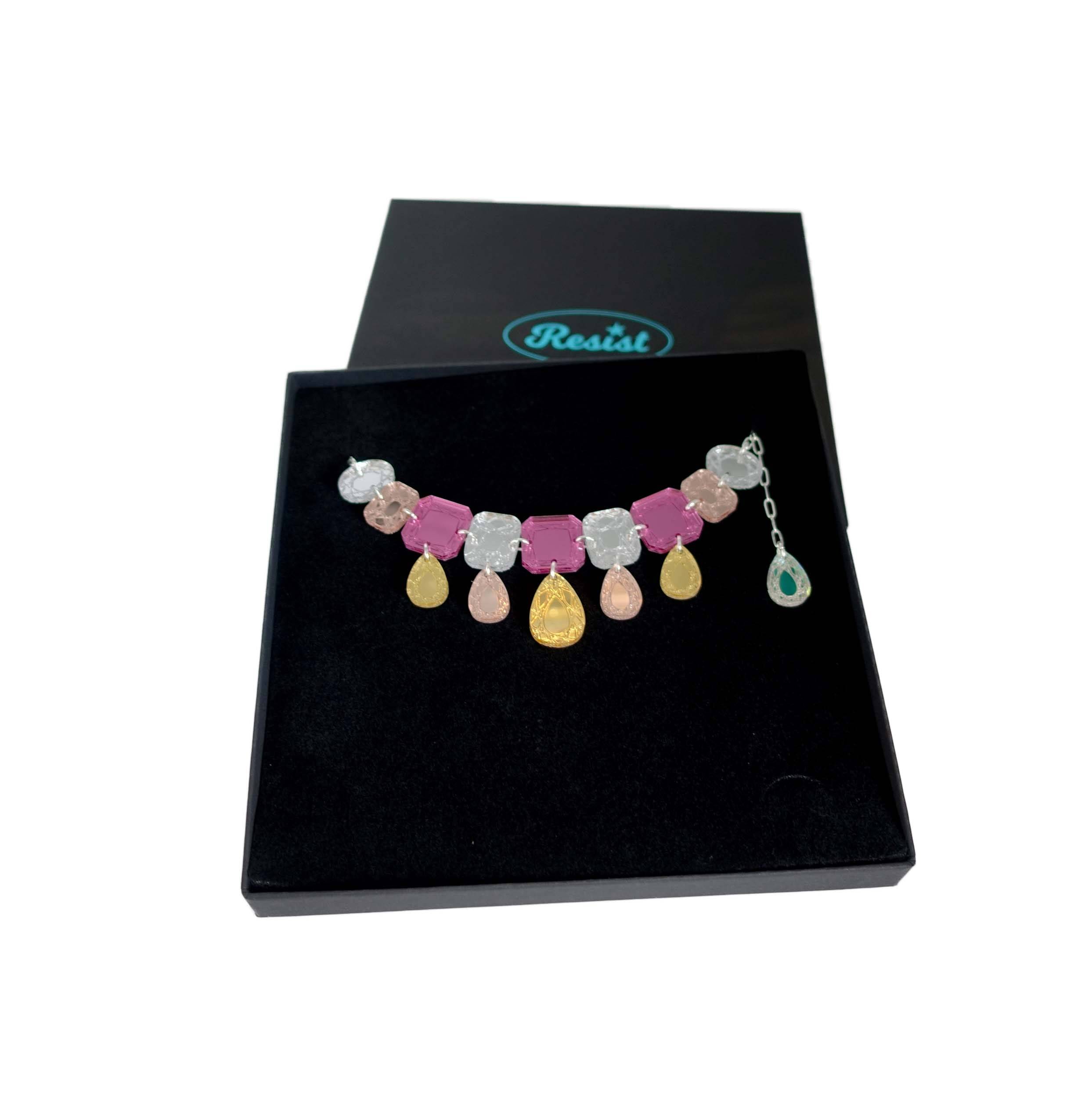 Austerity jewels necklace in golden pink colours, shown in a large Wear and Resist gift box.