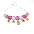 Belle Epoque jewels necklace in golden pink colours, designed by Sarah Day for Wear and Resist. £2 goes to Women for Refugee Women.