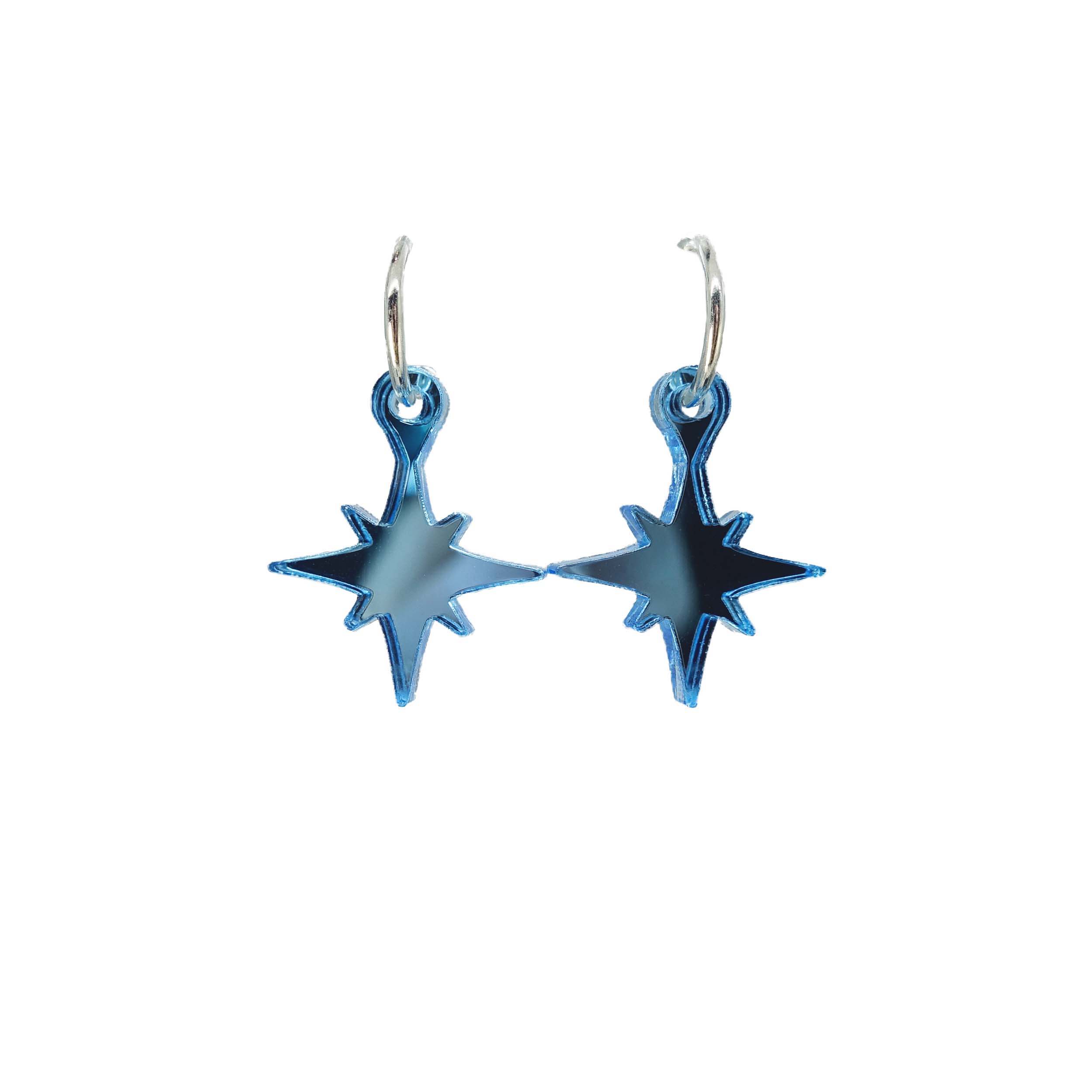 Vintage star earrings in sky blue from the Bronte Collection, shown hanging against a white background.