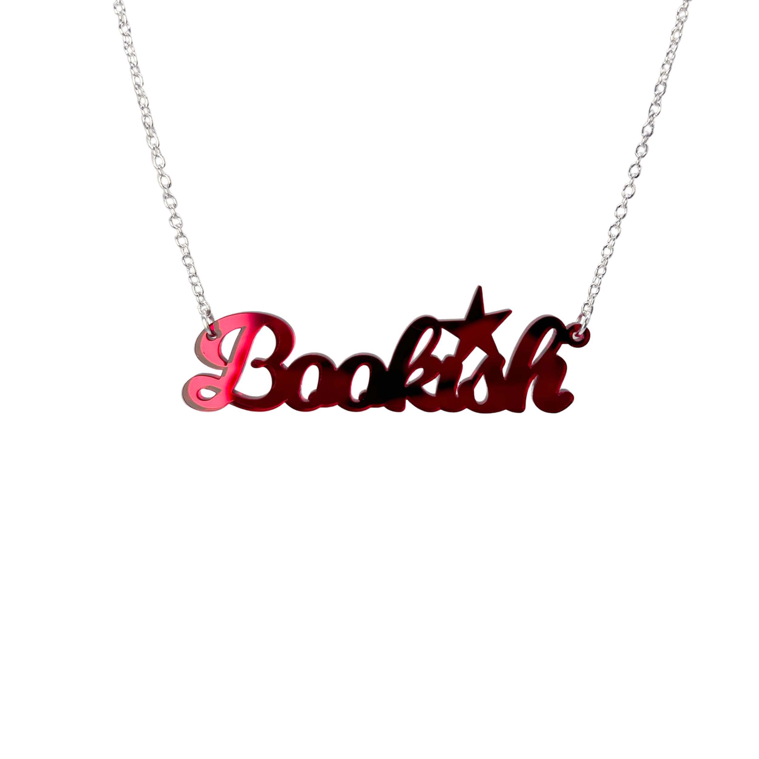 Ruby red mirror bookish necklace shown on a white ackground.