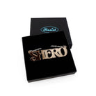 Bronze mirror Shero necklace shown in a Wear and Resist gift box.