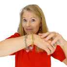 Sarah Day, founder of Wear and Resist wears both charm bracelets.