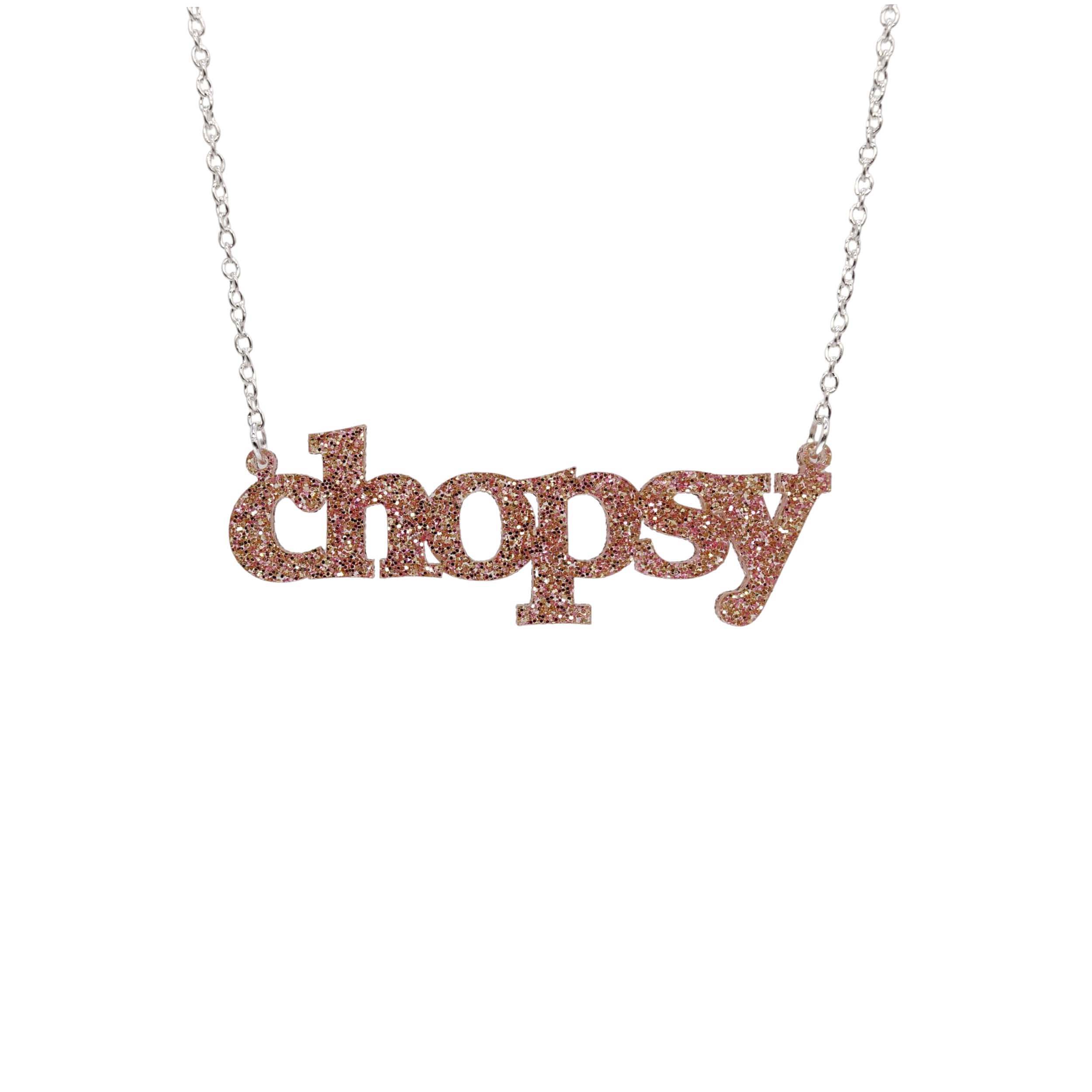 Chopsy necklace in pink fizz glitter against a white background.
