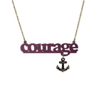 Courage necklace in cassis with bronze dangling anchor etched with the words, 'hold fast,' shown hanging against a white background.