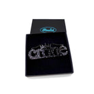 Crone necklace in black glitter, shown in a Wear and Resist gift box.
