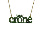 Crone necklace in moss glitter, shown hanging against a white background.