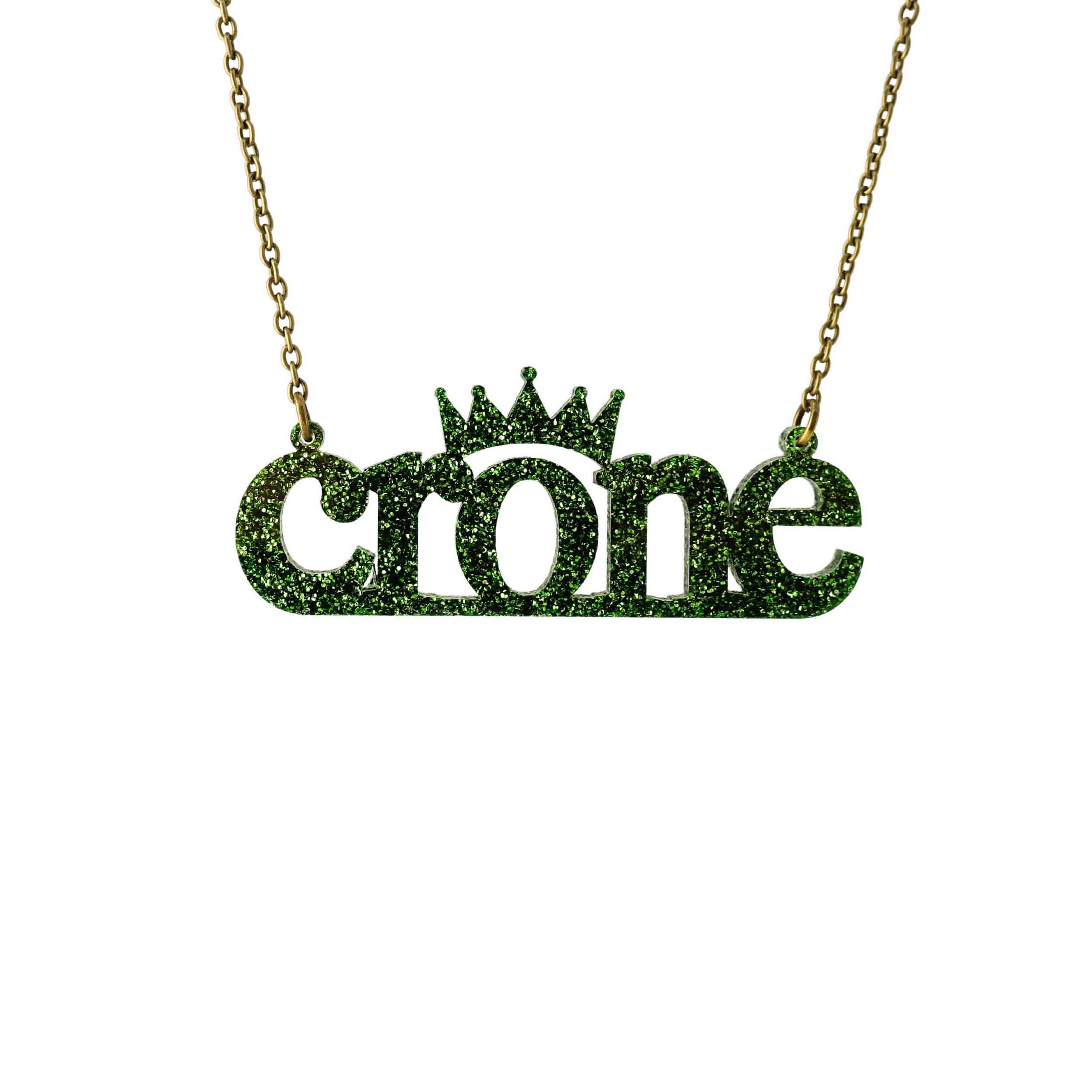 Crone necklace in moss glitter, shown hanging against a white background.