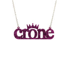 Crone necklace in purple glitter, shown hanging against a white background.