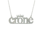 Crone necklace in silver glitter, shown hanging against a white background.