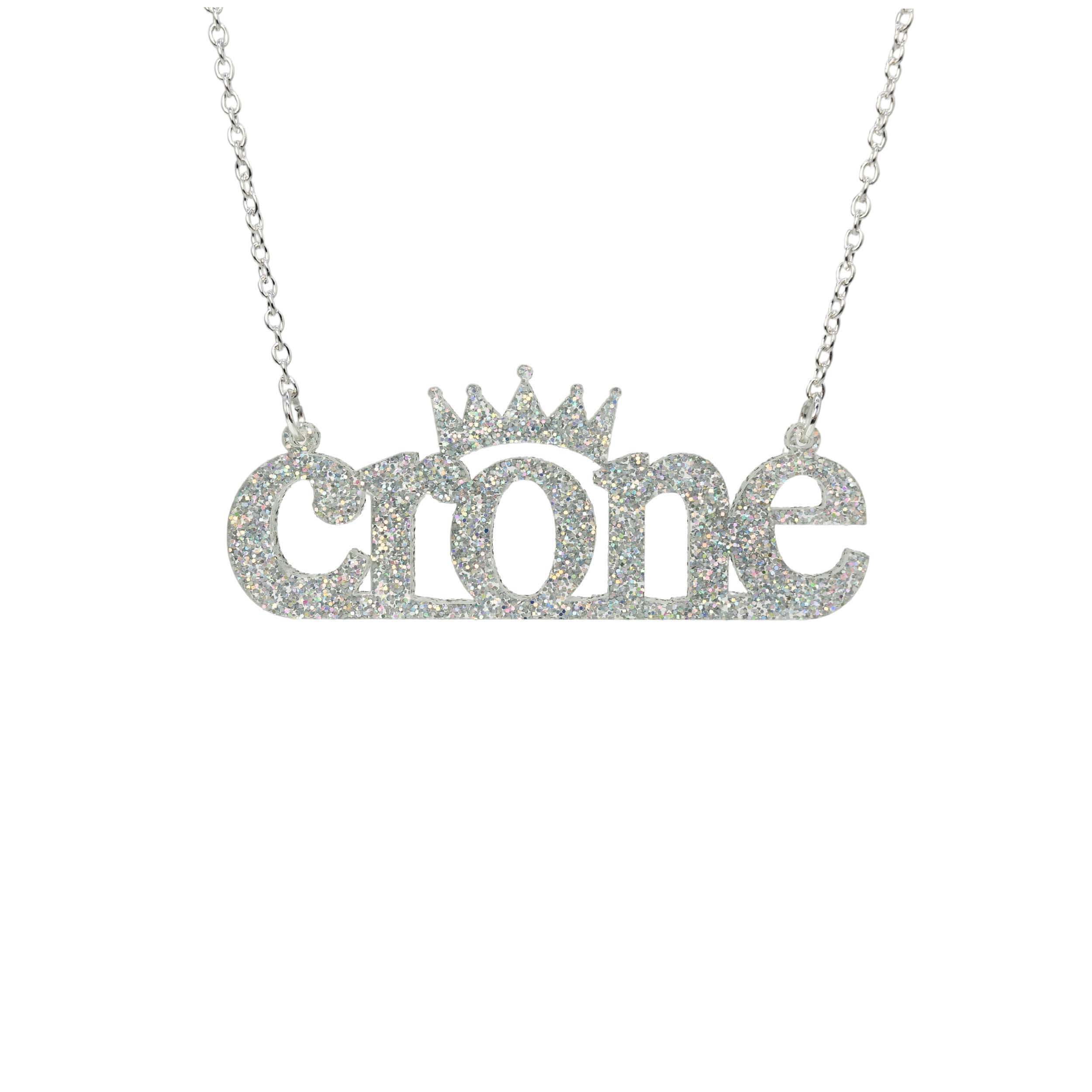 Crone necklace in silver glitter, shown hanging against a white background.