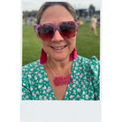 Amy wears a Difficult Woman necklace in neon pink. Designed by Sarah Day for Wear and Resist.