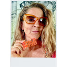 Difficult Woman necklace in summmer orange as seen out in the Persisterhood!