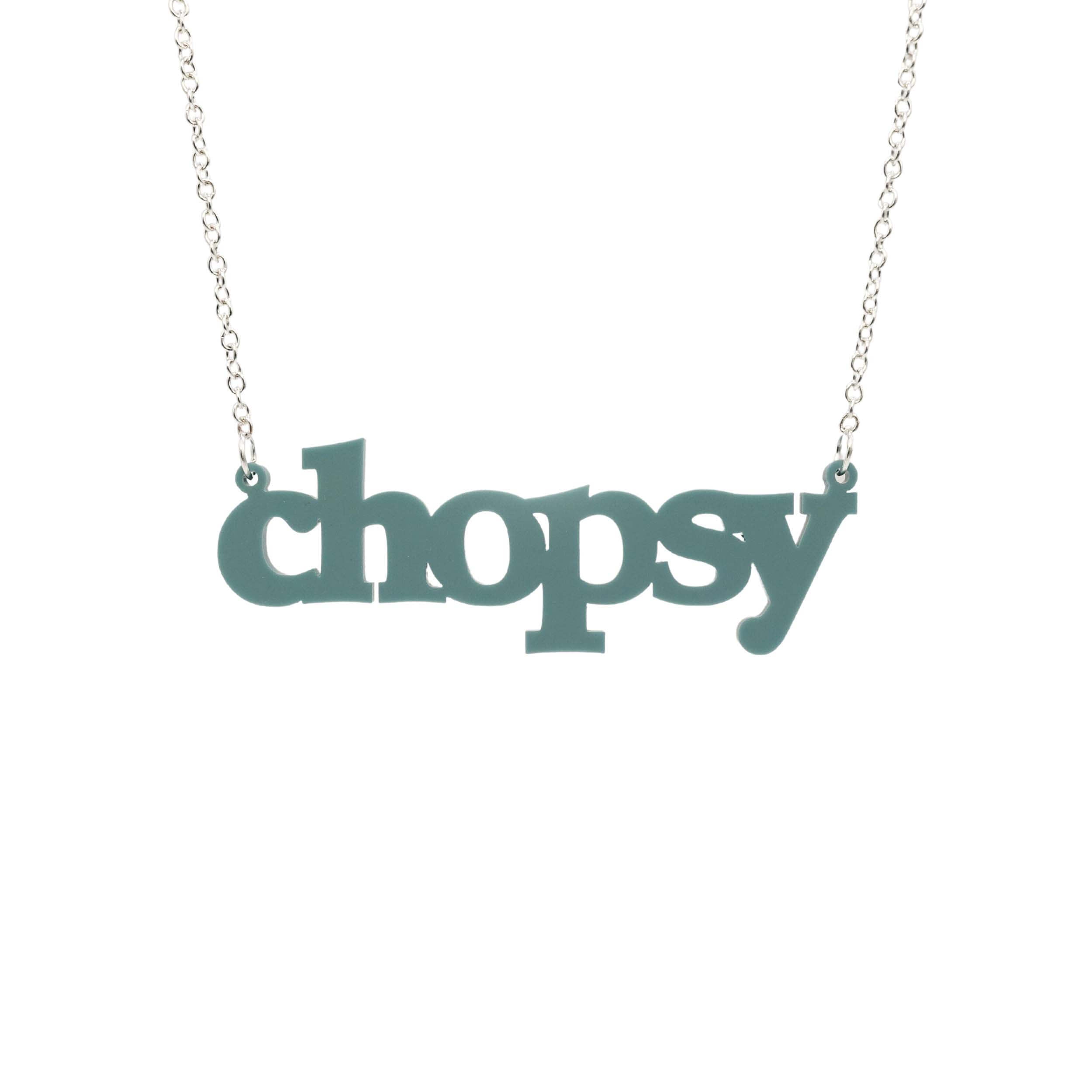 Duck egg green Chopsy necklace shown hanging against a white backround.
