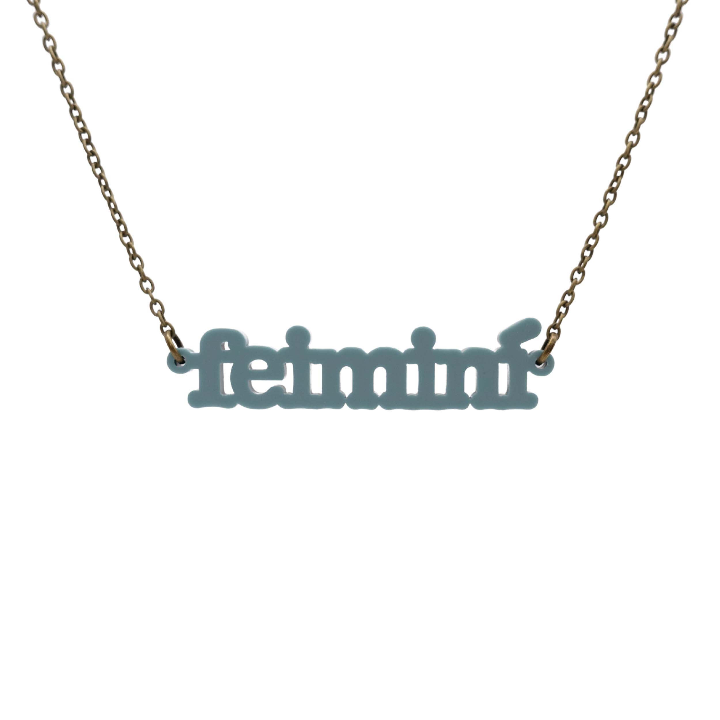 Irish Gaelic Feiminí necklace in duck egg green, shown hanging against a white background.