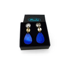 Small Belle Époque french drop earrings in electric blue. Shown in a small Wear and Resist gift box.