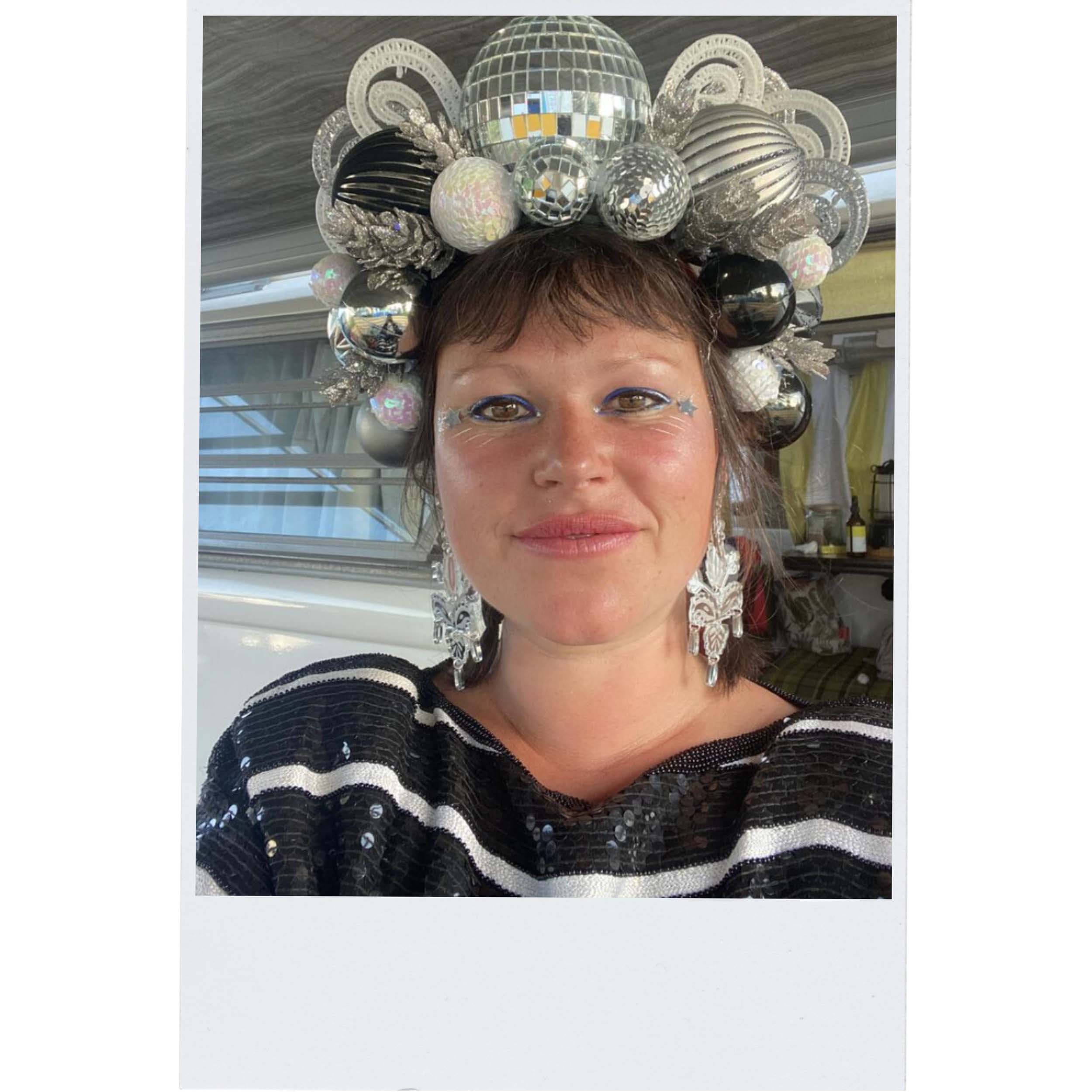 All silver Festive Drop statement earrings as worn by the Persisterhood.
