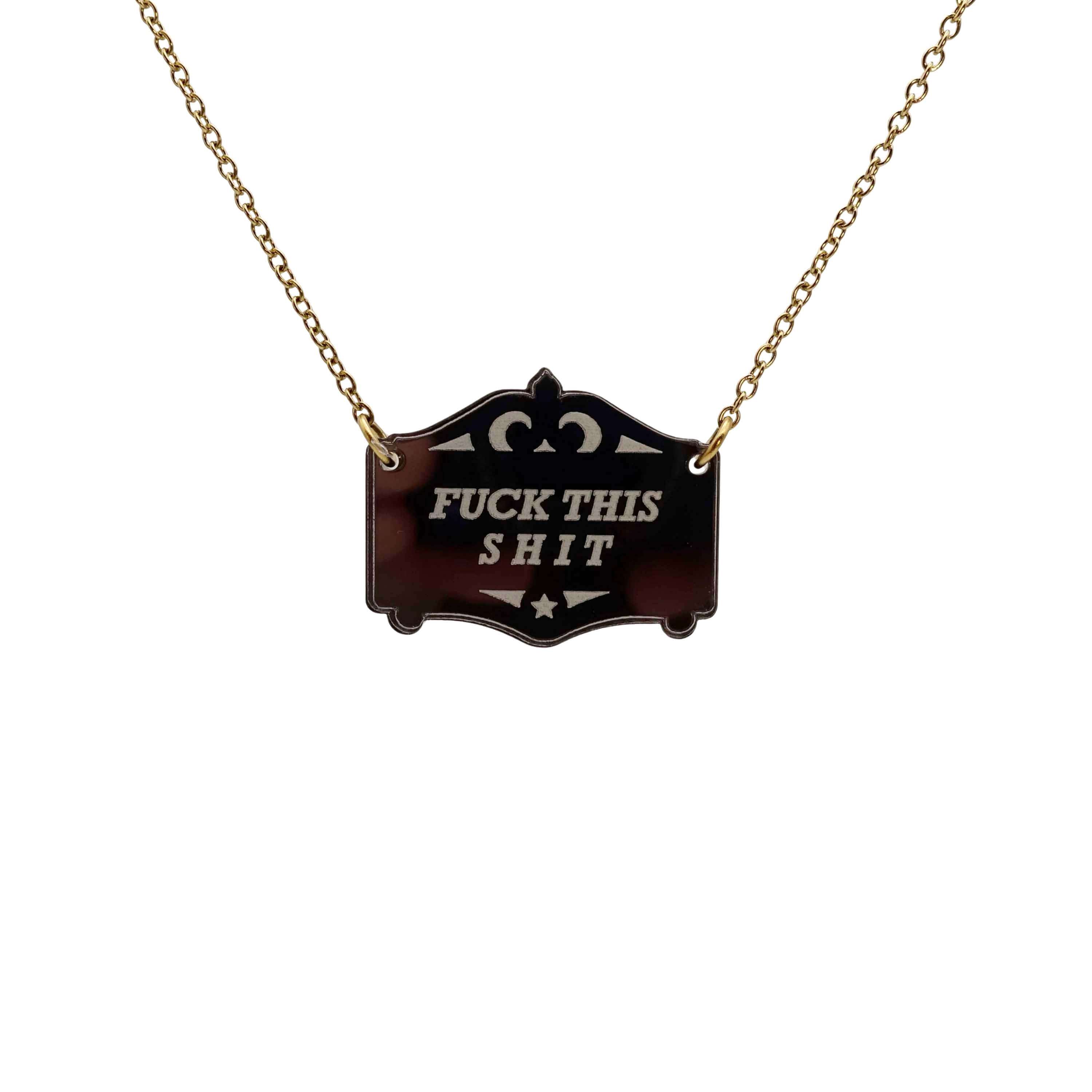 F*ck this sh*t mirror cowboy necklace in bronze, shown hanging on a gold plated stainless steel chain.