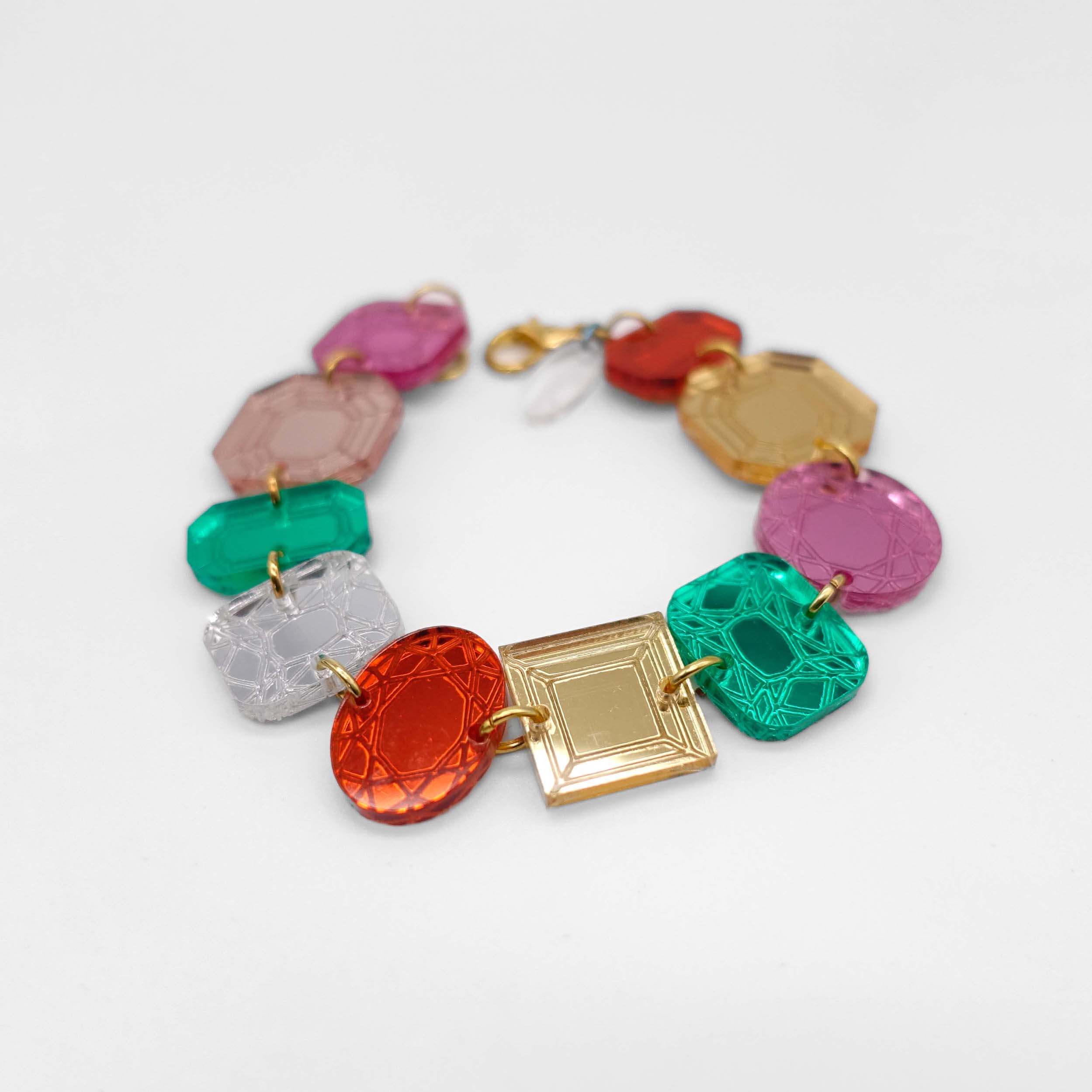 Funky Jewel mismatched gem bracelet, designed by Sarah Day as part of the Austerity Jewels collection, shown on a white background. Designed by Sarah Day for Wear and Resist as part of the Austerity Jewels for Brexit Britain collection.  